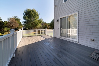 Rear Deck with Sliders to the dining room