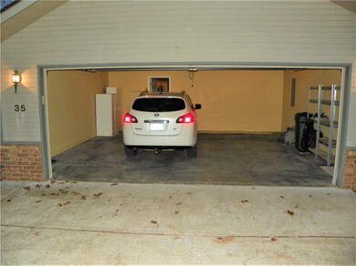 This is not your Grandpa's 2 Car garage - it's very wide and also has attic pull-down stairs for additional storage.
