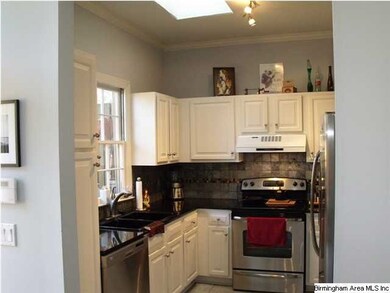 Updated kitchen with honed granite, stainless and 