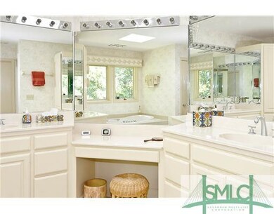 Master Bath/Spa. The Master Bath enjoys two vaniti