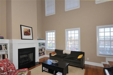 Living room w/gas FP & built-ins.