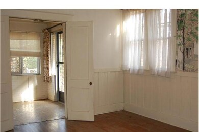 The large dining room opens up to the adorable sun