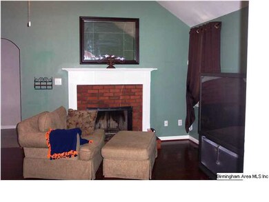 Another view of family room and fireplace