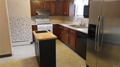 The large kitchen work space offers newer cherry c