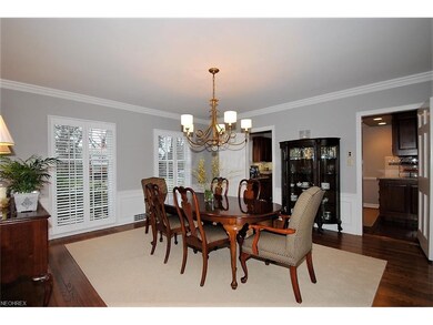 Freshly painted dining room with floor to ceiling 