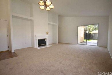 Spacious living room with sloping ceilings and med