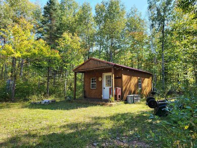 Exterior space featuring a yard