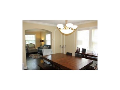 Dining room opens to kitchen and living room and h