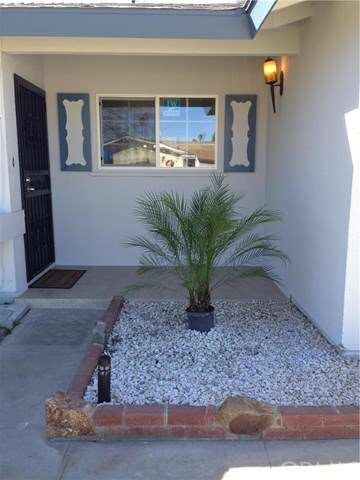 APPROACHING THE FRONT PORCH ENTRANCE