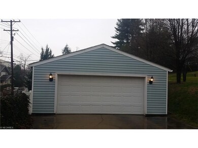 Two-car garage with 3 openers
