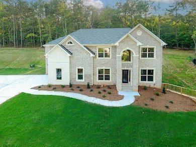 View of front of property featuring a front lawn