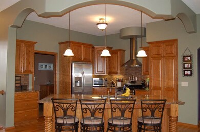 This chef's kitchen features stainless steel appli
