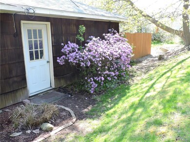 Side entrance to the attached garage. Were in bloo