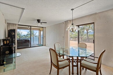 Living room with ocean view & direct access to both lanais
