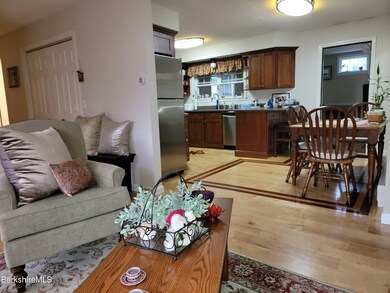 Living into dining area and kitchen