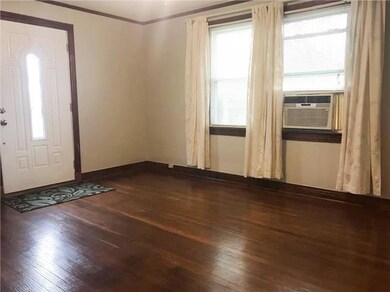 The living room measures approximately 12' x 15'.