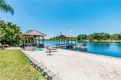 White Sandy Beach with seawall, pavilion, dock and