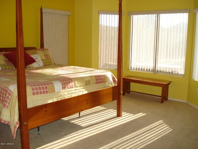Master Bedroom overlooks backyard & wash