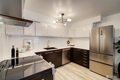 NEW KITCHEN! Cabinets, countertop, hardware, sink, lighting and appliances, all new!