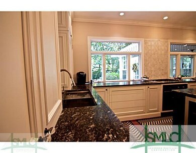 Kitchen. Granite counter, new appliances, wine coo