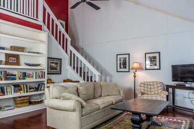 Third Bedroom: The third bedroom features more large windows and a roomy closet.