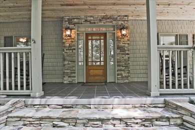 Stone entrance and wood ceilings with 