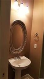 Half bath from hallway off of the kitchen