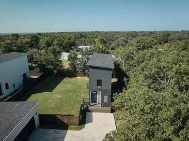 View of subject property featuring a forest