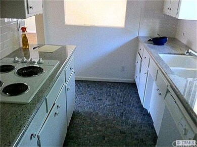 View of kitchen looking toward Living Room and ent