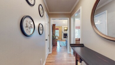 Welcoming entryway with hardwood floors.