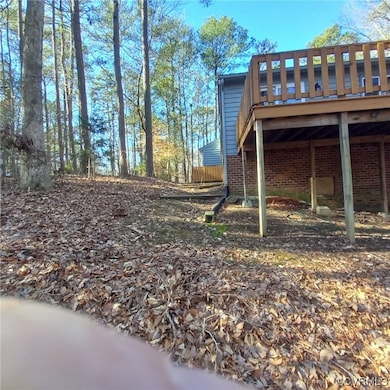 View of yard featuring a deck