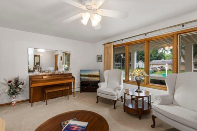 The inviting living room boasts a picture window overlooking the front yard.  Original hardwood floors waiting to be discovered underneath the carpet.  *Piano is included*