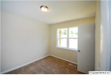 BEDROOM 2 IS 11 X 11 WITH NEW CARPET AND FRESH PAINT.