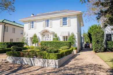Front facade and driveway with electric gate acces