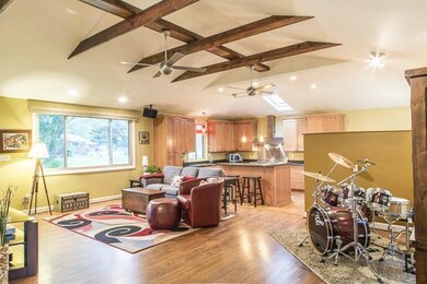 Light filled and open floor plan with vaulted ceil