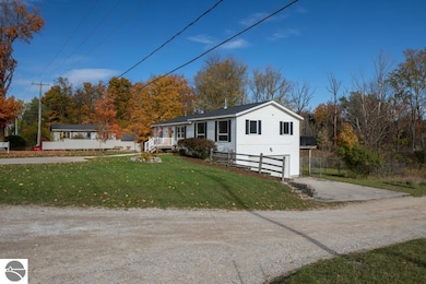 8335 S Maple City Rd, Maple City, MI 49664 - photo 4