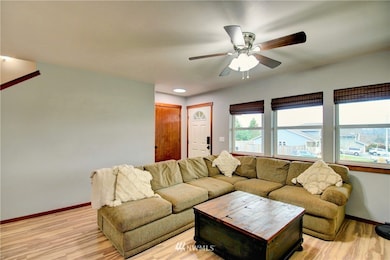 An ample living room with great lighting.