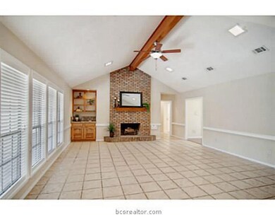 Living Room. A cathedral ceiling, with exposed bea