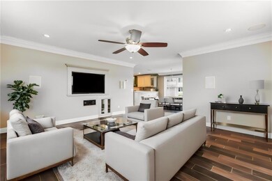 Living room has wonderful light with custom audio
