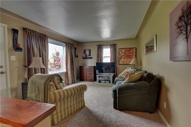 Bright living room with coffered ceiling and newer