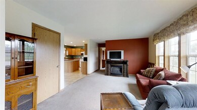 Open concept living room and kitchen gives this lo