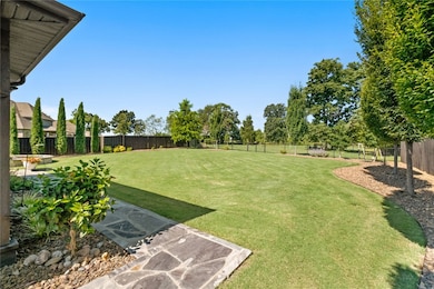 Meticulously Landscaped Backyard that backs up to