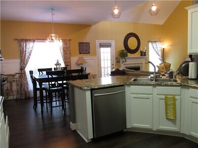 View from the kitchen to your breakfast room & den area.  Very open plan!