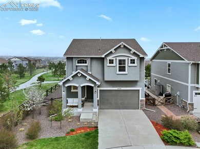 Craftsman house featuring driveway, fence, an atta