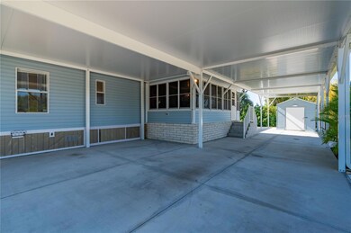Front View of Sunroom and Carport
