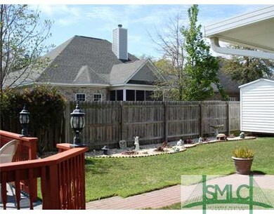 Exterior Back. CUSTOM DECK AND GAZEBO WITH BRICK W