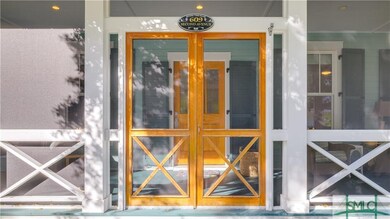 The  double screen doors and working shutters are 