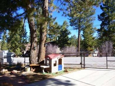 Fully fenced and dog run! Vacant land to east and 