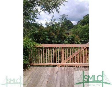 Exterior Back. Great deck space with large back  y