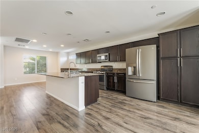 Kitchen featuring stainless steel appliances, a ce